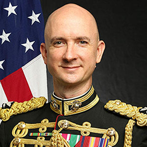 Col. Jason Fettig, conductor